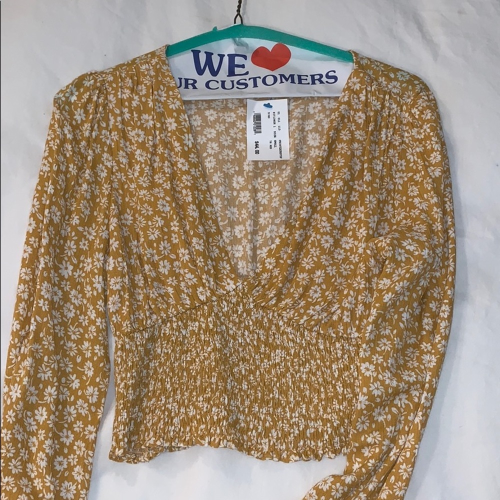 Plunging neck line crop blouse